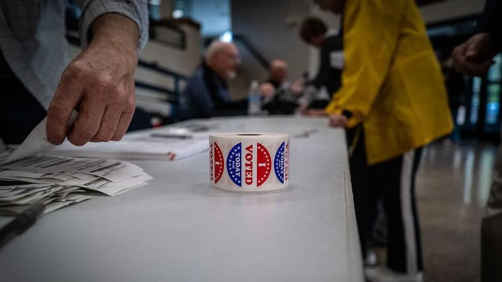 A roll of “I Voted” stickers sits on a table at a polling place on Nov. 8, 2022.
