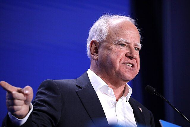 Minnesota Governor Tim Walz speaking with supporters at a debate watch party at the Mesa Convention Center in Mesa, Arizona.