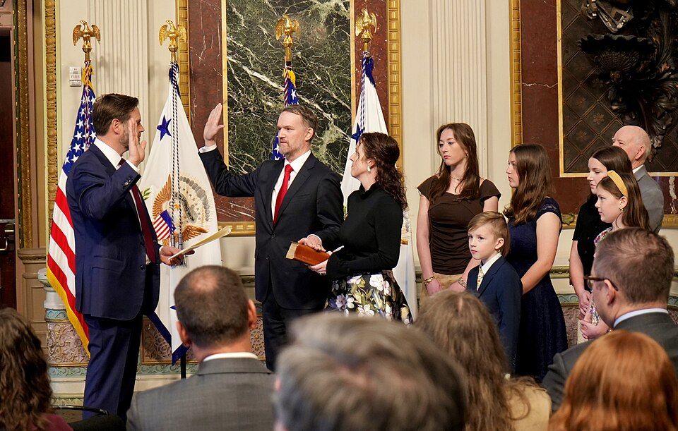 Jamieson Greer being sworn in as U.S. Trade Representative by Vice President JD Vance in April, 2025.