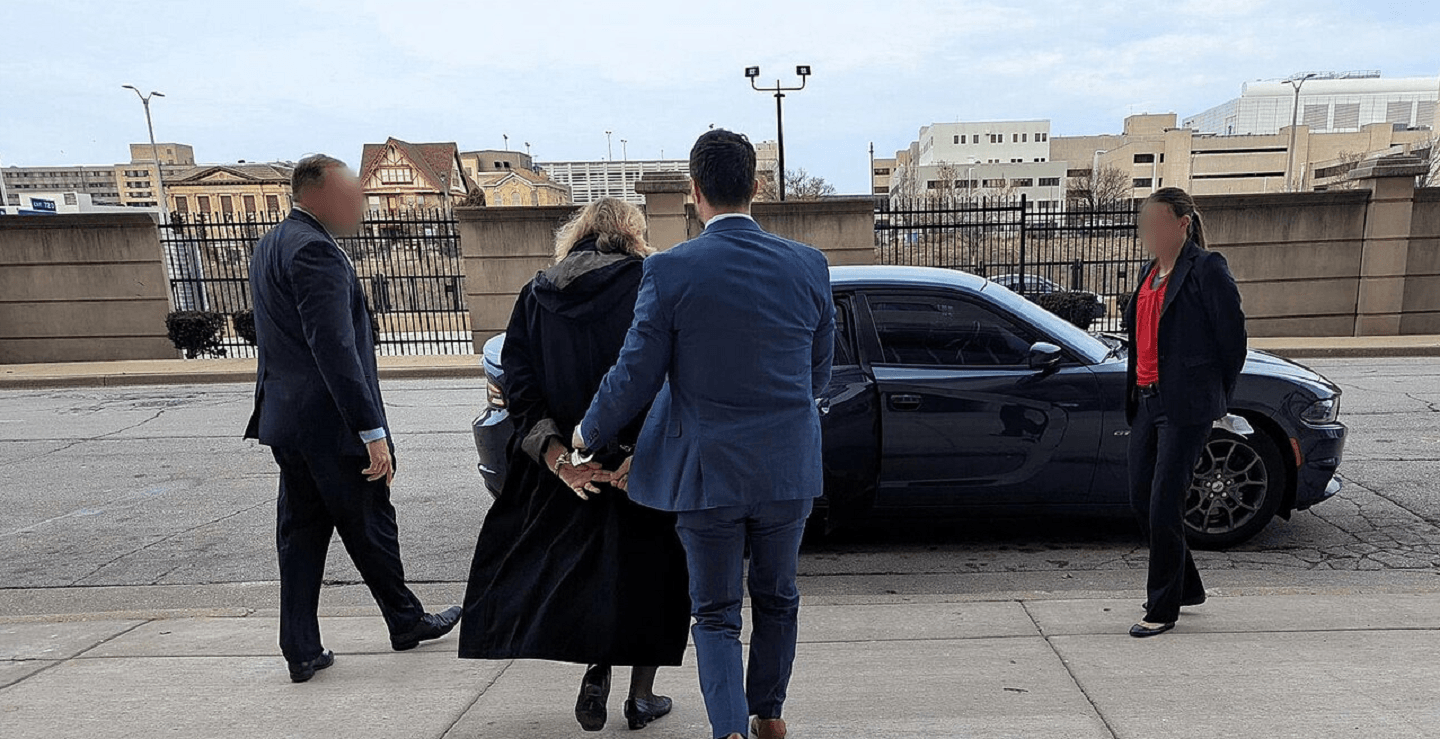 FBI agents arresting Wisconsin Circuit Court Judge Hannah Dugan in April, 2025