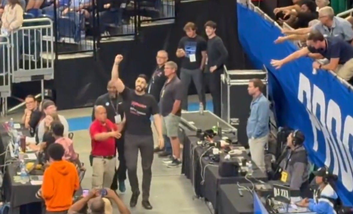 Enes Kanter Freedom being escorted out of the game
