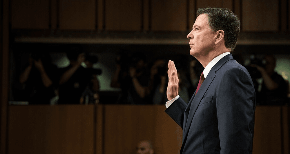 James Comey being sworn in to testify to the Senate Select Committee on 8 June 2017