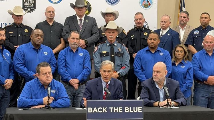 Texas Gov. Greg Abbott meets with law enforcement officers in Houston at an event highlighting legislative initiatives that support law enforcement and target crime.