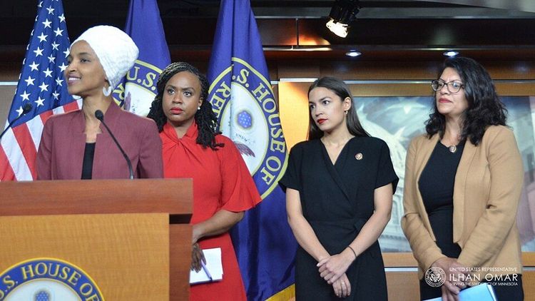 The DSA-aligned "Squad" — Reps. Ayanna Pressley, Ilhan Omar, Alexandria Ocasio-Cortez, and Rashida Tlaib — at a press conference.