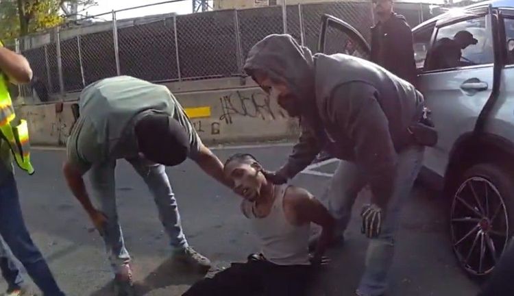 Screenshot from NYPD bodycam showing Oscar Belgal after his arrest.