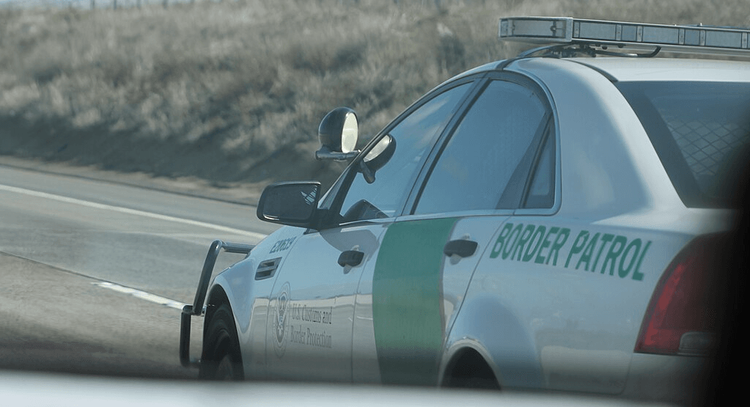 A Chevrolet Caprice PPV of the United States Border Patrol driving southbound on San Diego Freeway.