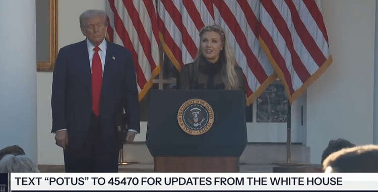 Erika Kirk speaks at the Rose Garden ceremony with president Trump behind her.