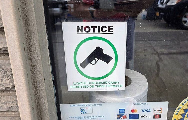  A sign allowing for lawful concealed carry of firearms at a gas station in Fredonia, NY