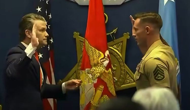 SECWAR Pete Hegseth administers the oath during Jones' reenlistment. 