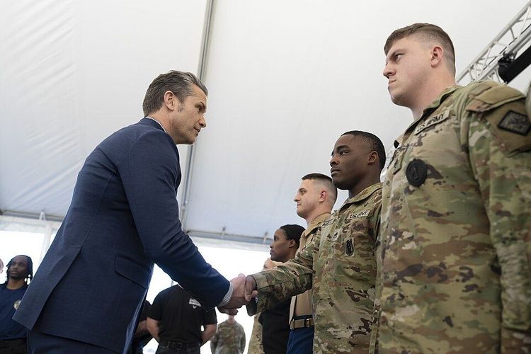 Secretary of War Pete Hegseth awards challenge coins to troops at General Dynamics Ordnance and Tactical Systems during his recent Arsenal of Freedom Tour, Camden, Ark.