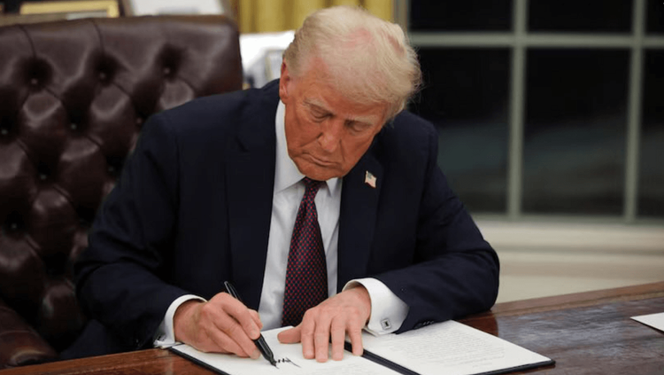 President Trump signing an executive order