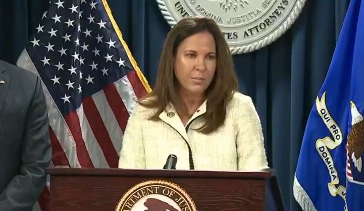 U.S. Attorney Leah Foley announcing the charges against 6 in the sham marriage scheme.