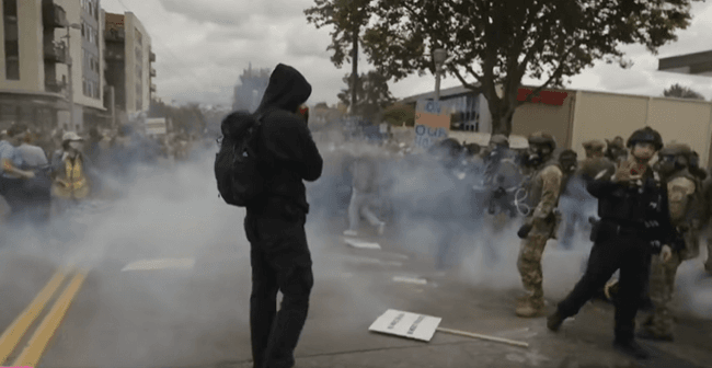 Protestors clash with ICE at the Portland facility