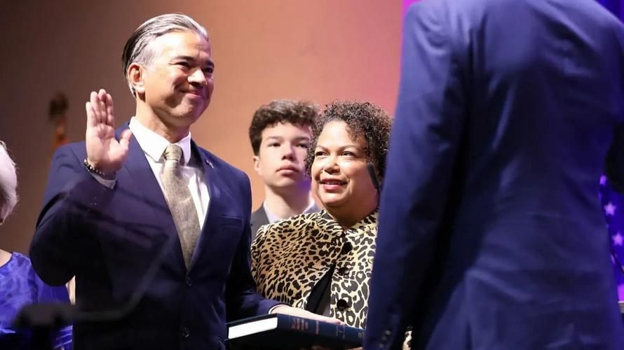 California Attorney General Rob Bonta takes the oath of office beside his wife, California Assemblymember Mia Bonta, Jan. 6, 2023. Photo: State of California Department of Justice / Used with Permission