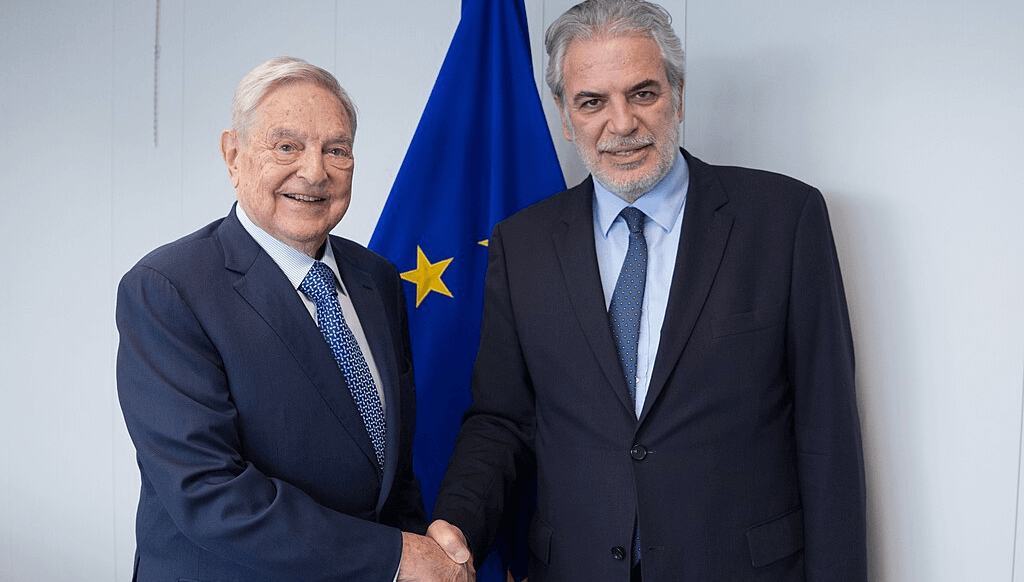 George Soros, on the left, and Christos Stylianides, member of the European Commission