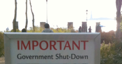 A Government shutdown sign seen at the Statue of Liberty in 2013
